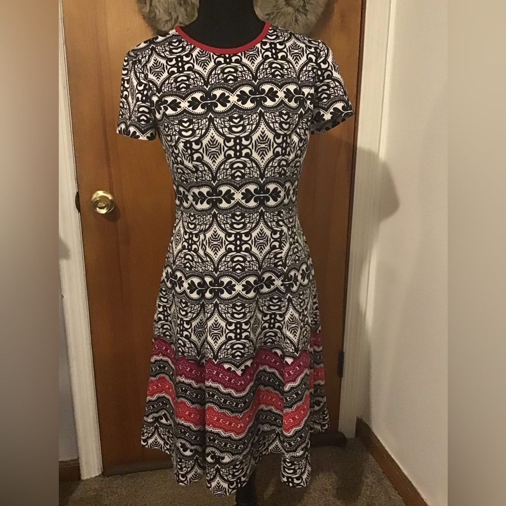 Unique design black and white with hints of red dress